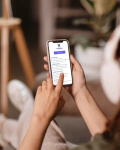 woman using smartphone reading the SEO checklist